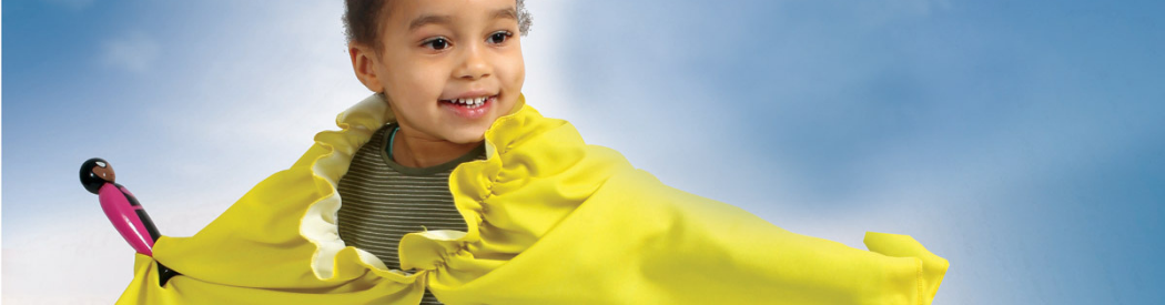 child playing with superhero figures