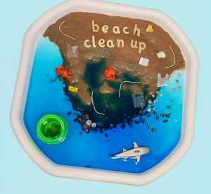 Beach clean up sand and water tuff tray activity for EYFS