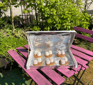 solar oven made from foil‑lined box for solar s&rsquo;mores activity