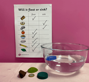 children recording sink or float results outdoors checklist