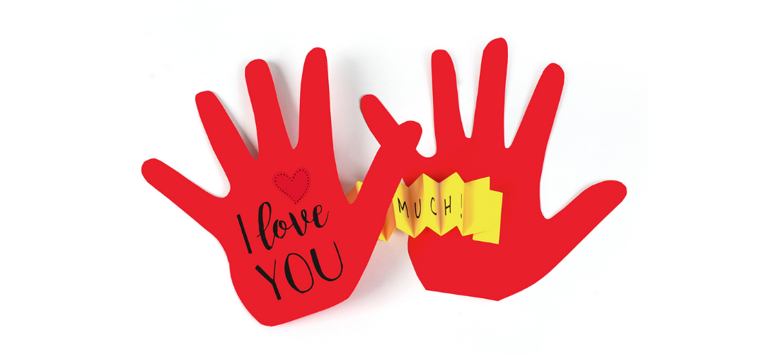 two hand prints cut out and connected with concertina card to create a card