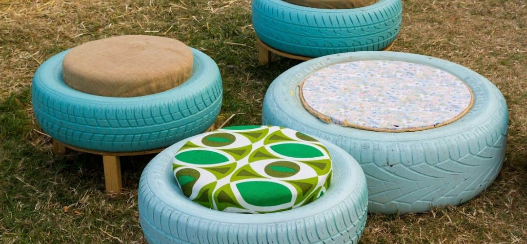 four blue tyres with cushions built into the centres