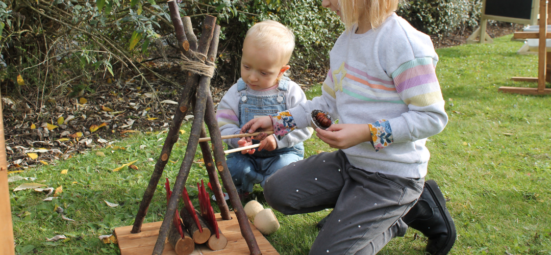 children playing with pretend fire