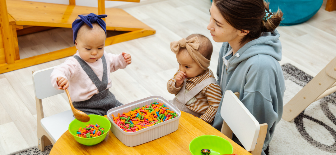 young children sorting coloured pasta