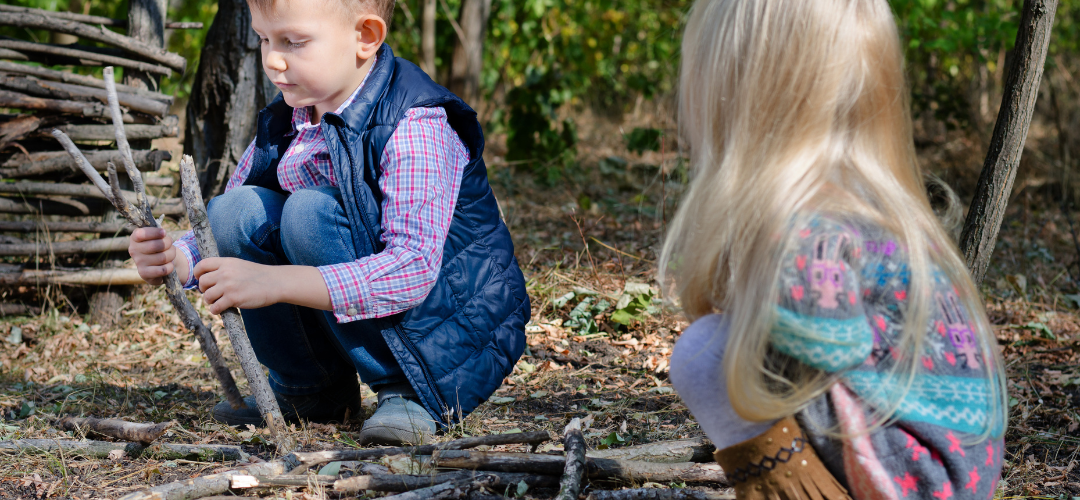 children collecting twigs