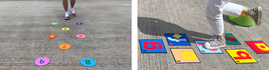 colourful letter and number hopscotch tiles on the ground