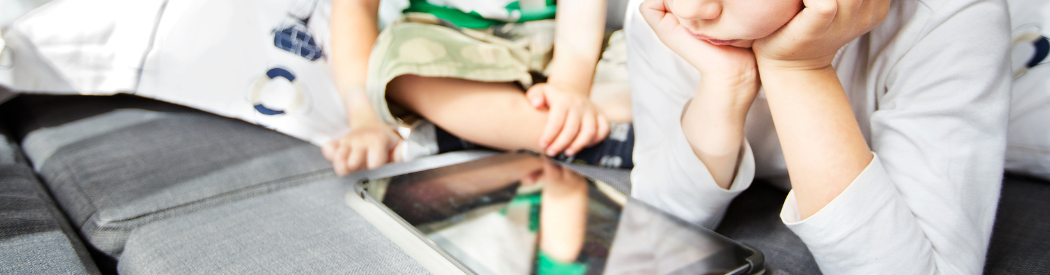 children watching a tablet