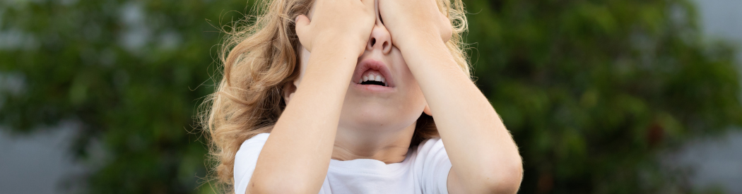 child covering their eyes during whats the time mr wolf