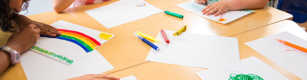 child decorating BSW posters