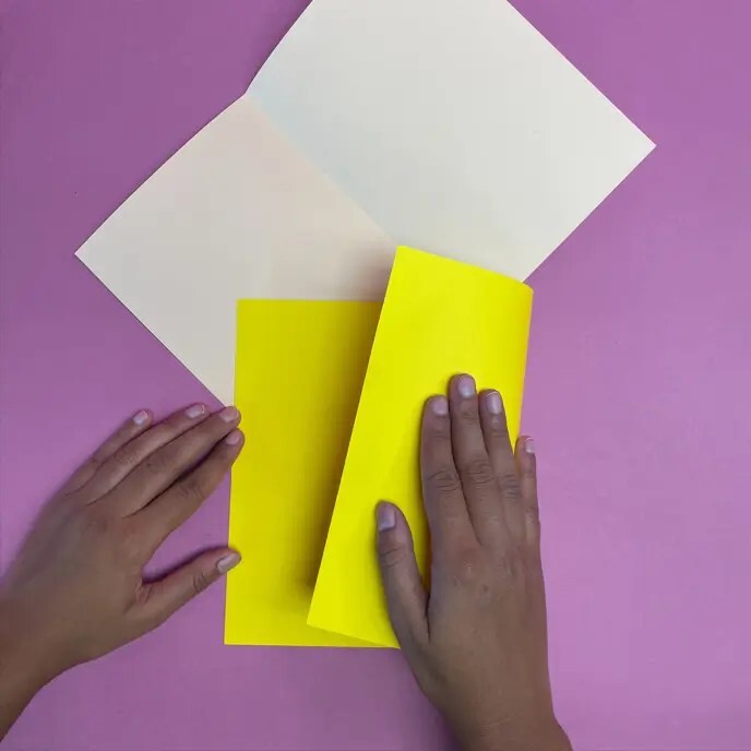 Person folding card