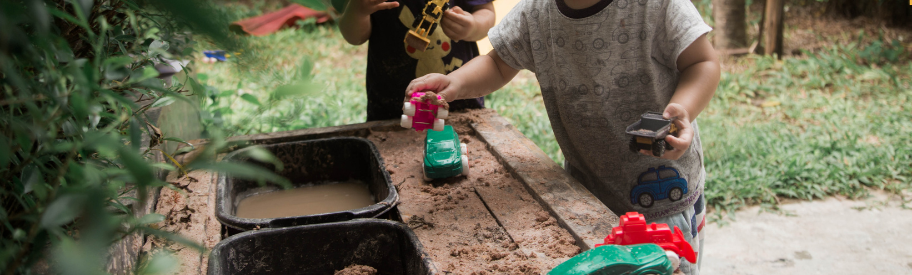 Outdoor play equipment and resources in a childminding garden