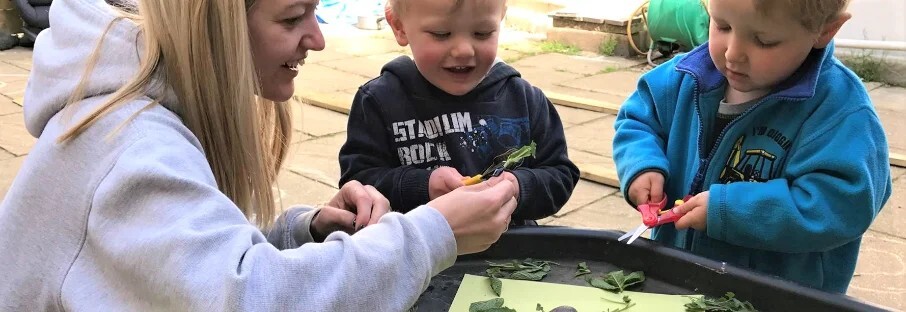 childminders playing with children