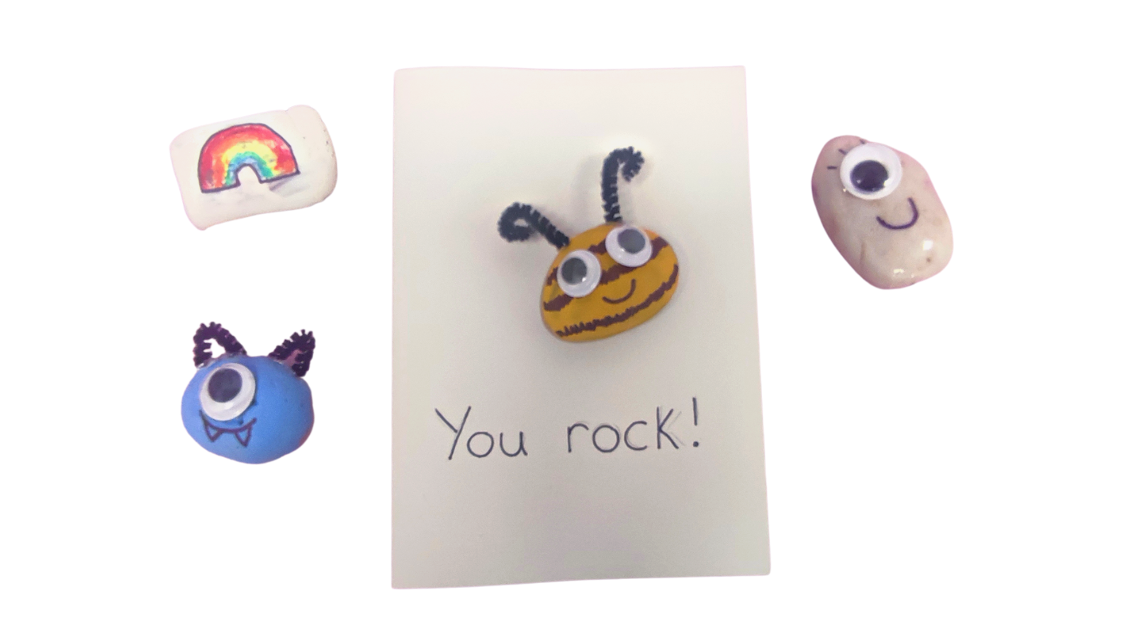 small pebbles that have been decorated with paint and googly eyes